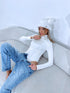 White VIENTOŅA bodysuit with high collar H73